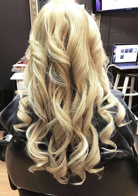 Curled hair extensions.