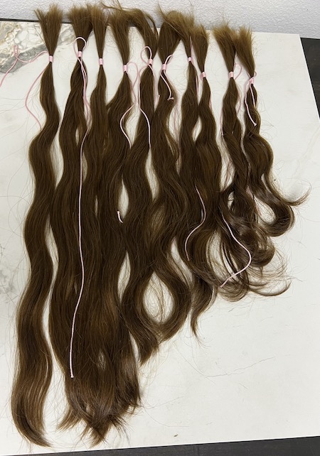 Double Drawn hair extensions.